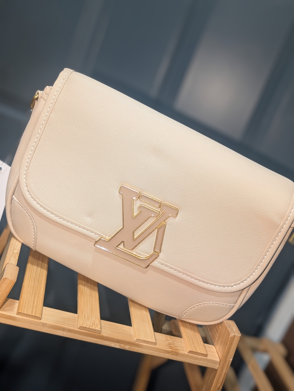 Fashion Inspired Cream Crossbody Bag with Gold Logo